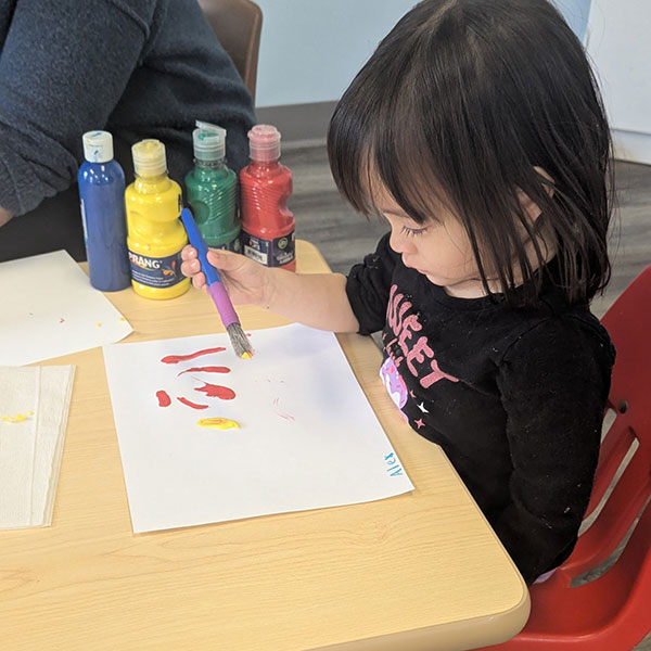 a child painting a picture