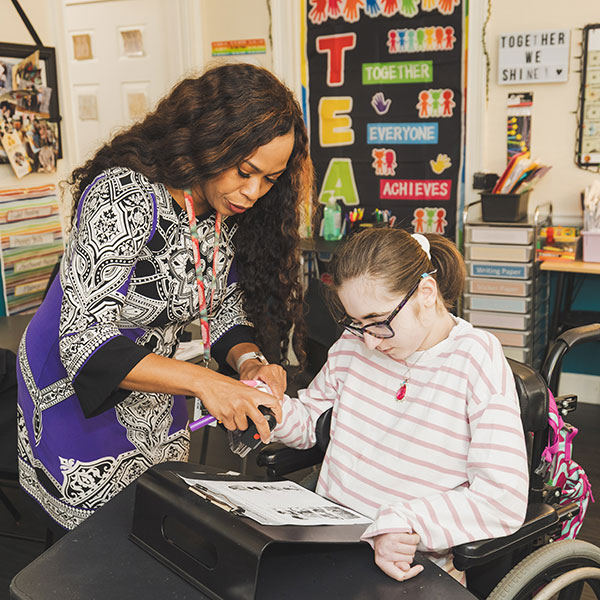 a teacher with a student